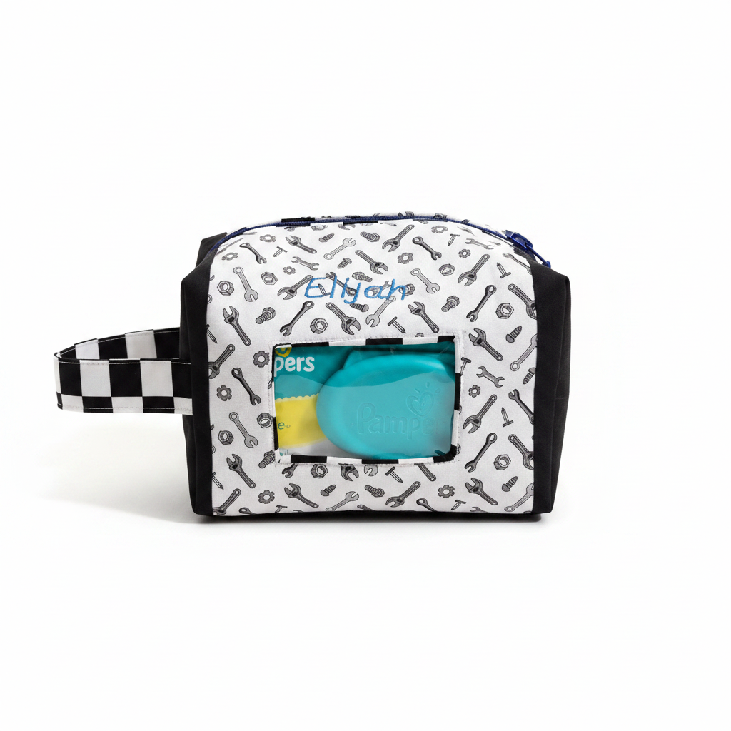 Custom handmade diaper and wipe pouch with tools print fabric and checkered strap, clean product shot