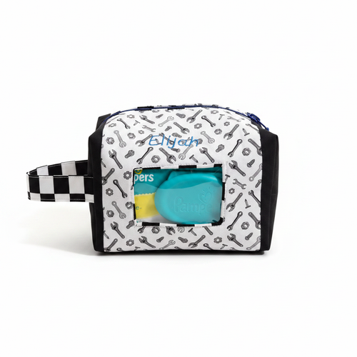 Custom handmade diaper and wipe pouch with tools print fabric and checkered strap, clean product shot